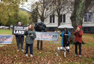 Protestors celebrate the delay of Bathurst's application 