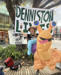 Protestors celebrate the delay of Bathurst's application 